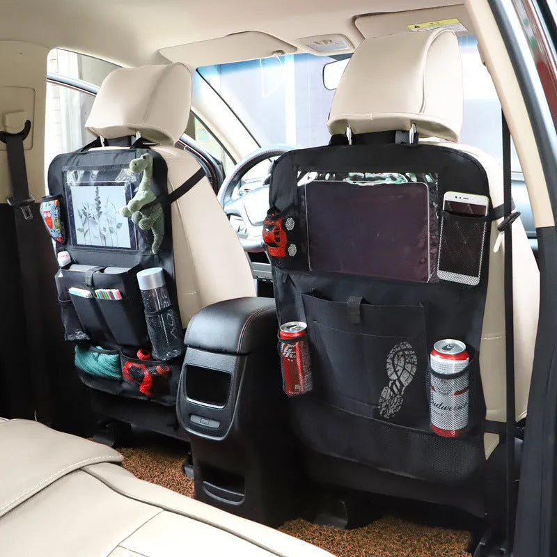 Black universal car organiser hanging storage bag with multiple pockets attached to car headrest