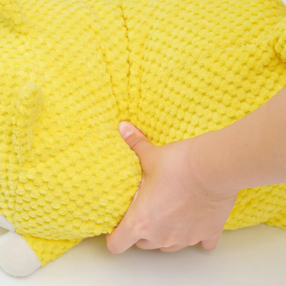 Plush calming dog toy with squeaker for chewing and anxiety relief, shown in large and medium sizes.