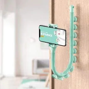 Black flexible rubber phone holder with suction cup base bent into an arc shape