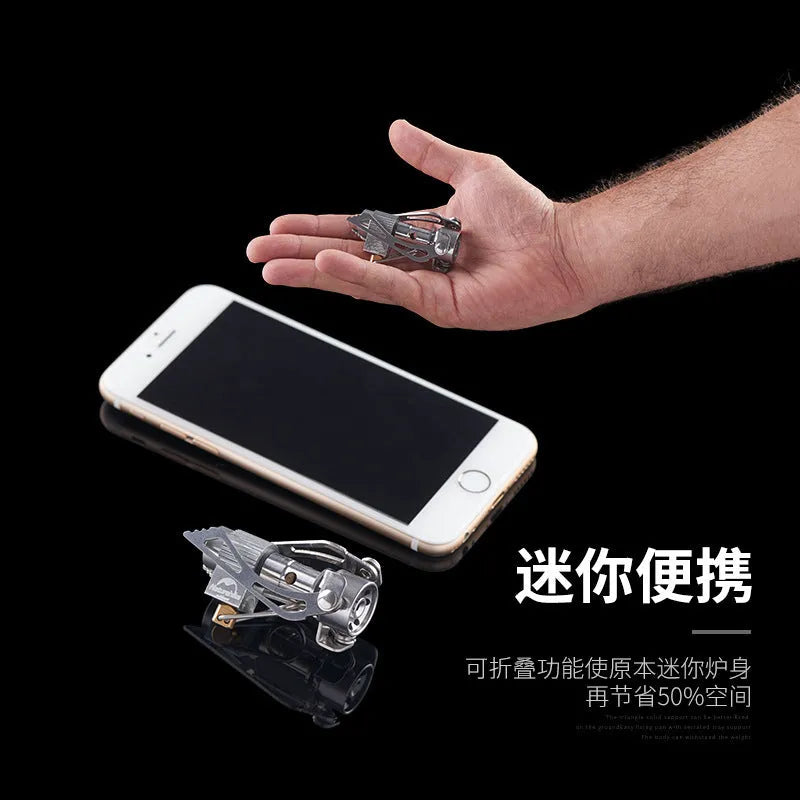 Portable folding mini camping stove made of stainless steel, copper, and aluminium with carry pouch