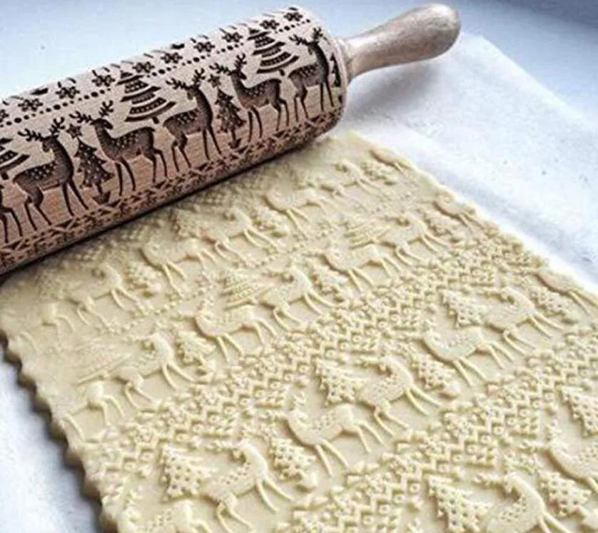 45cm long wooden rolling pin with embossed Christmas patterns like reindeer and snowflakes for baking.