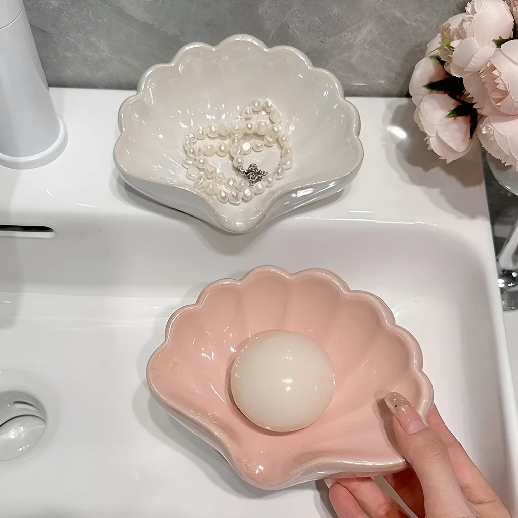 White shell-shaped plastic soap dish for bathroom countertops