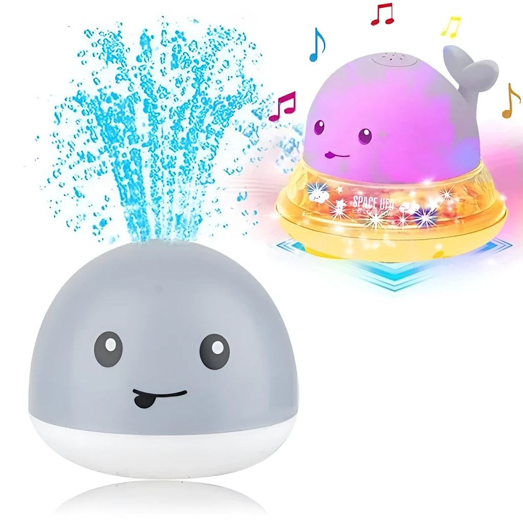 Whale-shaped electric bath toy spraying water with flashing lights, floating in baby bathtub
