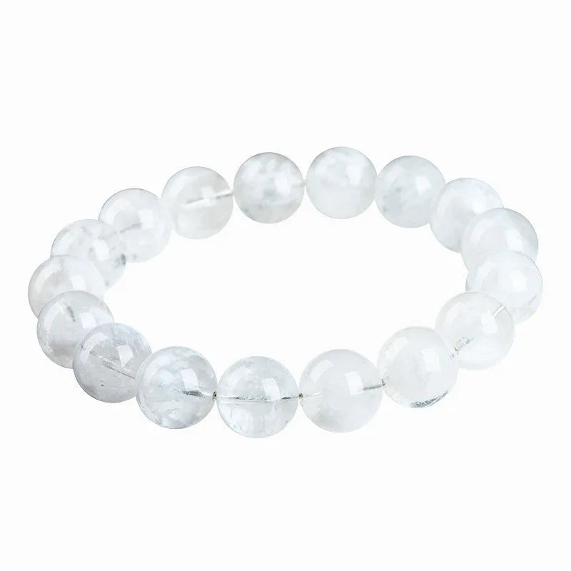 Geometric natural blizzard snowflake crystal women's bracelet with round beads on a white background.
