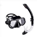 Black diving goggles with PC frame, silicone mask, adjustable strap, and transparent anti-fog lenses.