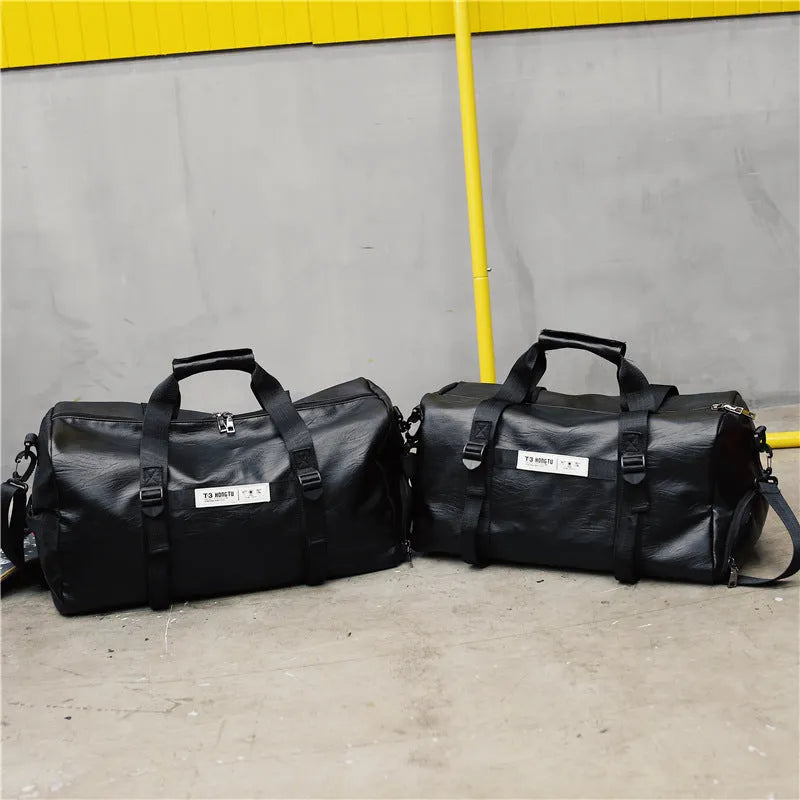 Black fabric portable travel bag shown in large 49cm and small 45cm sizes