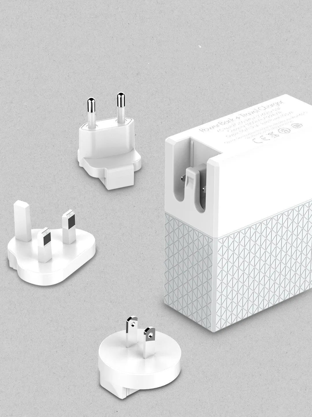 White two-in-one mobile power bank charger with built-in UK, EU, and US plug pins
