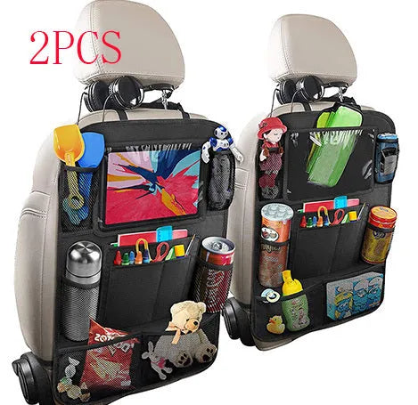 Car storage bag sewn from black Oxford fabric, 61 by 41 cm, fitted behind a car seat backrest