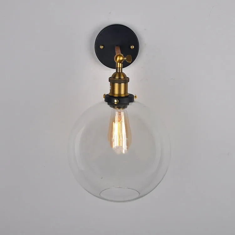 20cm round glass ball wall lamp with aluminium holder in amber, smoke grey, or transparent.