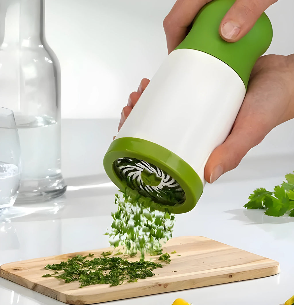 PP plastic and stainless steel herb grinder mill with removable top on a kitchen counter