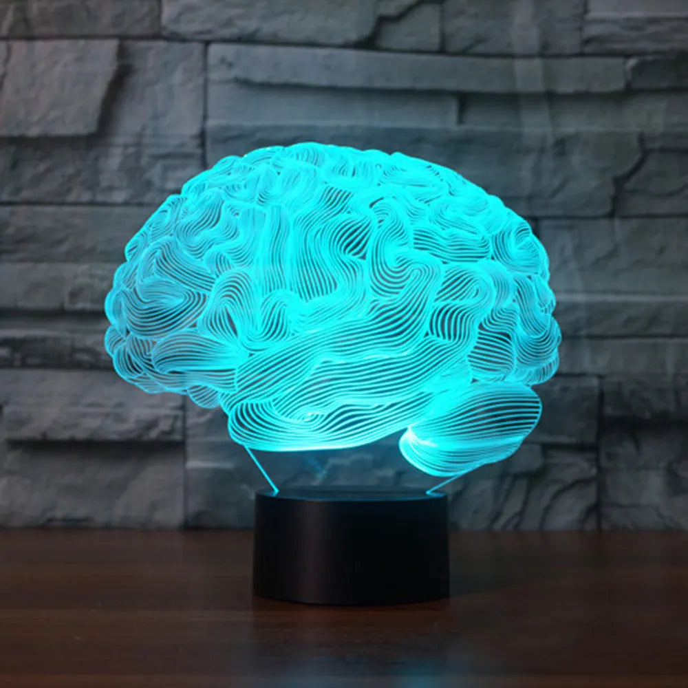 3D acrylic illusion LED desk lamp with colourful light display and remote control on a wooden surface