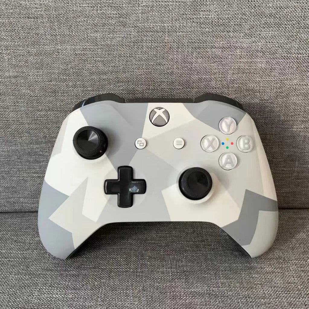Grey wireless gamepad for Xbox One with Bluetooth connectivity and standard controller layout