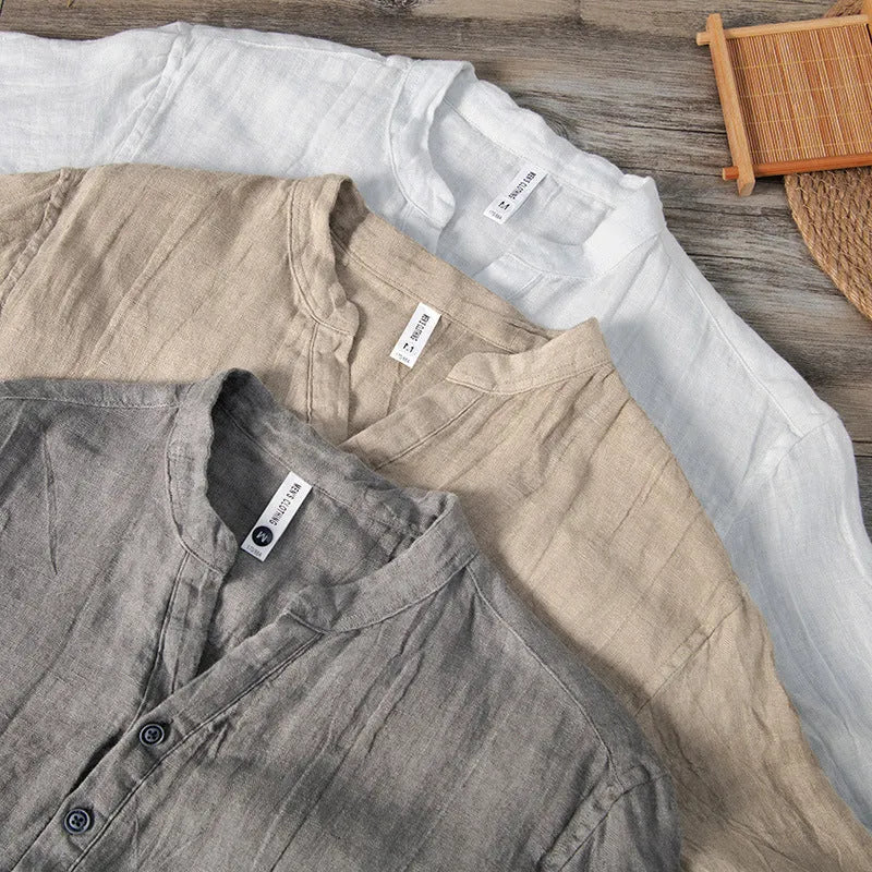 Retro-style solid colour linen pullover top with short sleeves and a striped pattern.