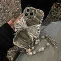 Bow design phone case with lanyard for iPhone 13 Pro in single shell bracelet colour