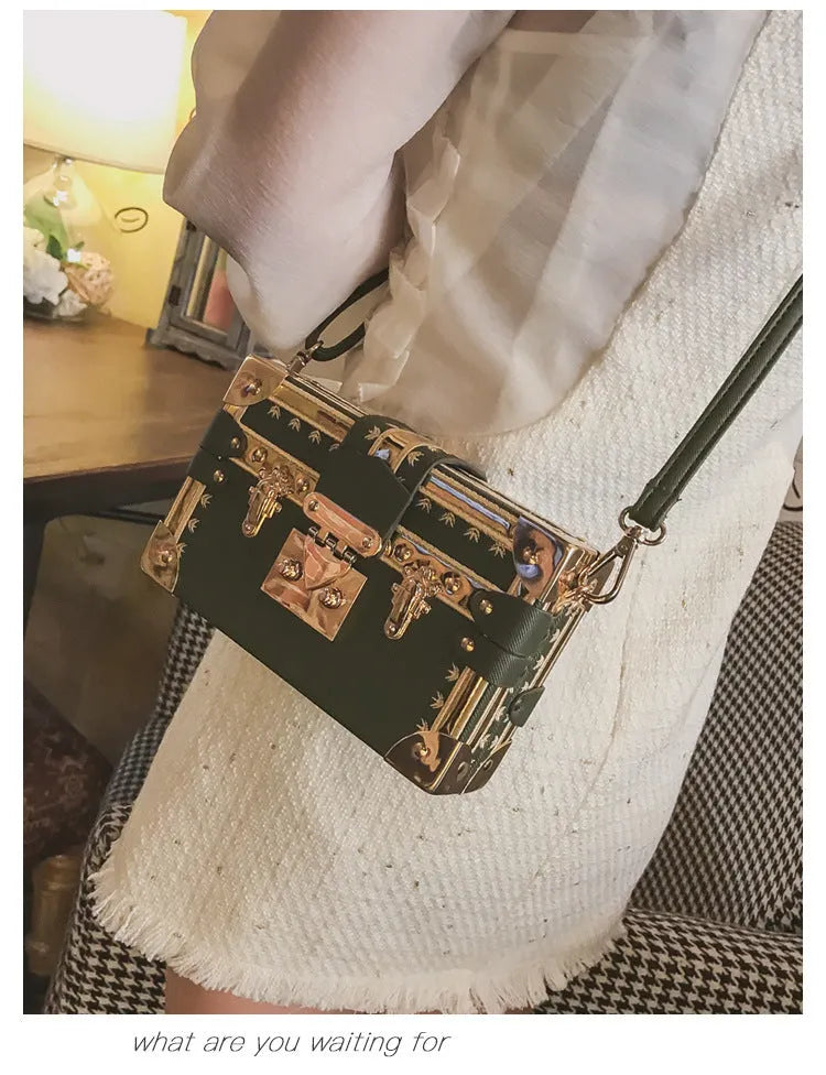 Women's hard PU leather shoulder bag with single adjustable strap and flap closure