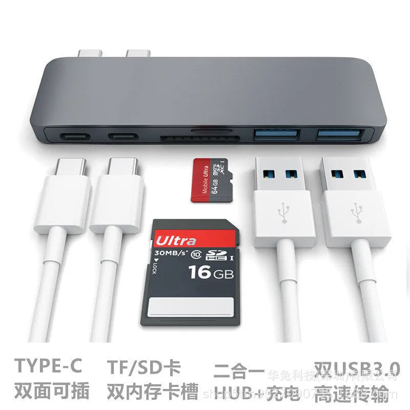 Compact USB-C hub with dual Type-C ports and SD card slot in grey aluminium finish