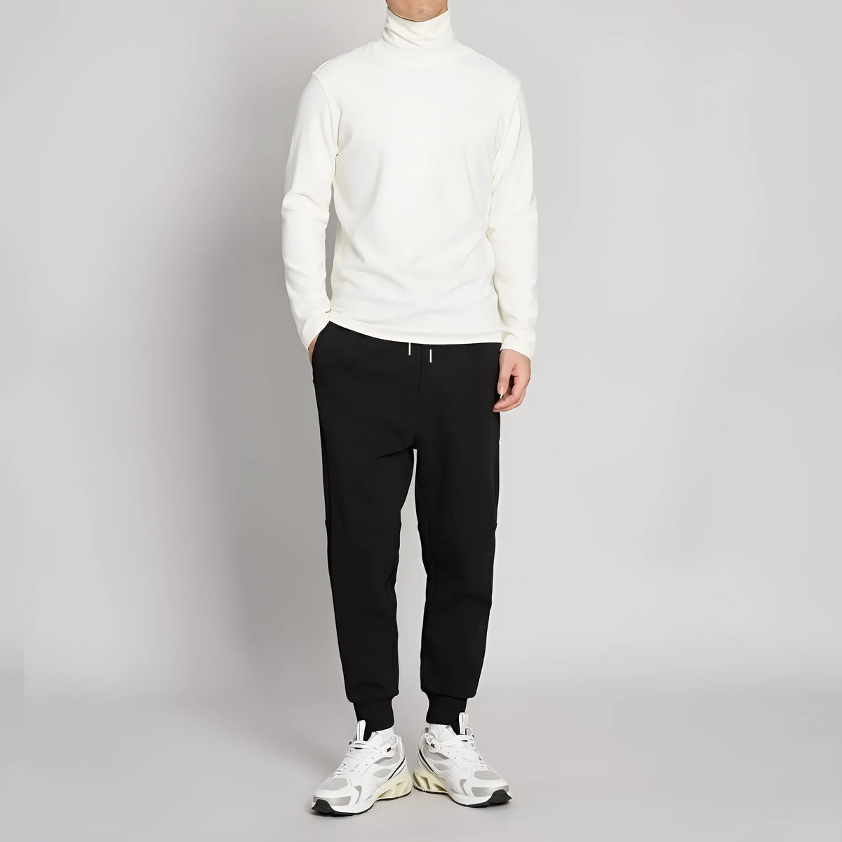 Men's mid-waist drawstring casual pants in black cotton blend, loose nine-length fit.