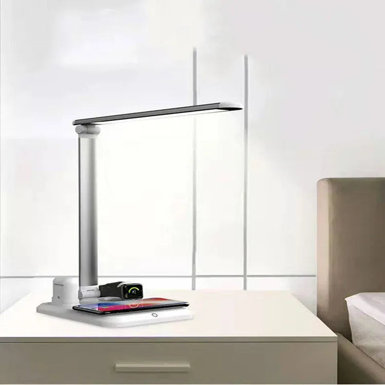 X-1 model 4-in-1 multi-function LED desk lamp with wireless charging pad in black or white finish.