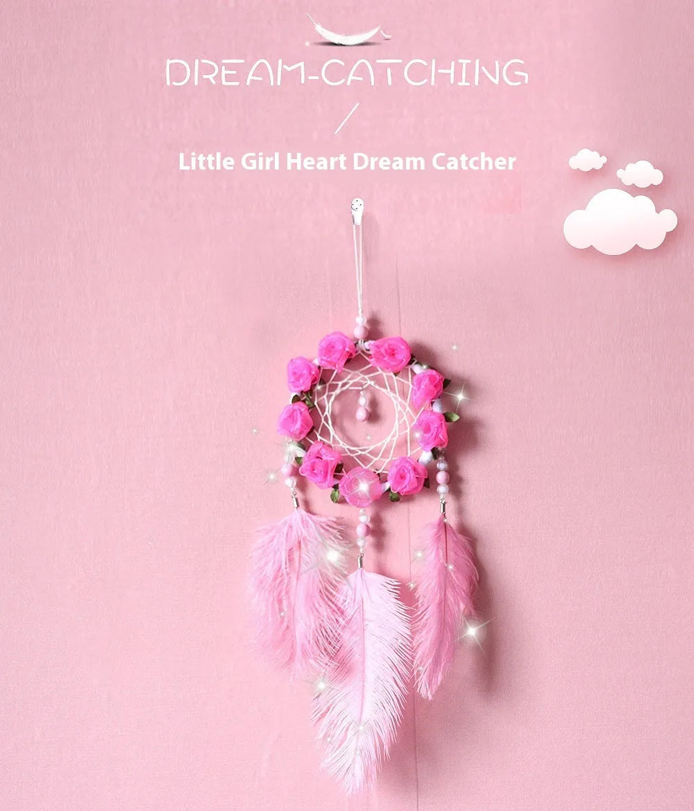Pink ostrich feather dreamcatcher wind chime wall ornament measuring 10cm