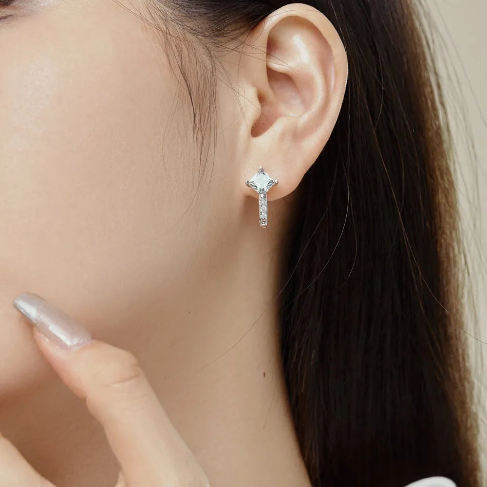 Pair of U-shaped zircon stud earrings in platinum white diamond colour on 925 silver, 10x14.5x17.5mm
