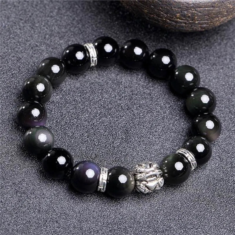 Natural obsidian bracelet with silver 999 clasp, showing cloud year pattern and lucky colour eye beads.