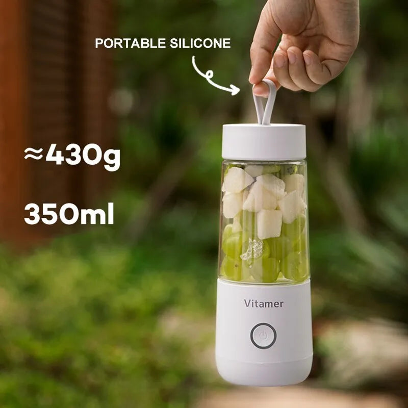 White portable USB blender bottle with silicone ring, 350ml capacity, and stainless steel blade on base.