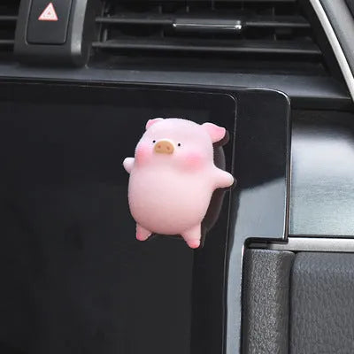 Set of eight cute cartoon pig resin car dashboard decorations on a car console