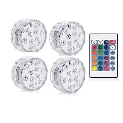 IP68 waterproof LED remote control diving light with 16 colour modes placed in a glass vase of water
