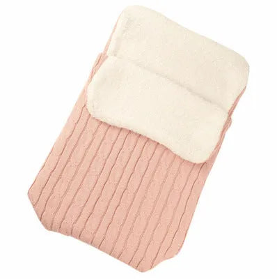 Envelope-style baby stroller sleeping bag in a plain colour, shown on a pram with lamb cashmere lining visible.