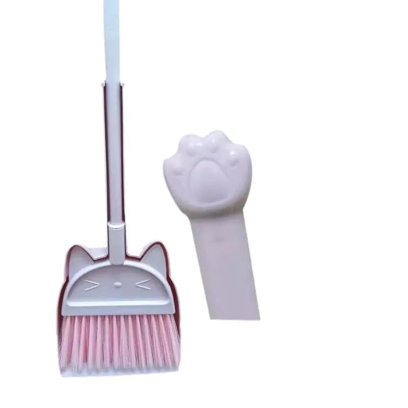 Purple broom and dustpan set with rotating brush holder on plastic construction