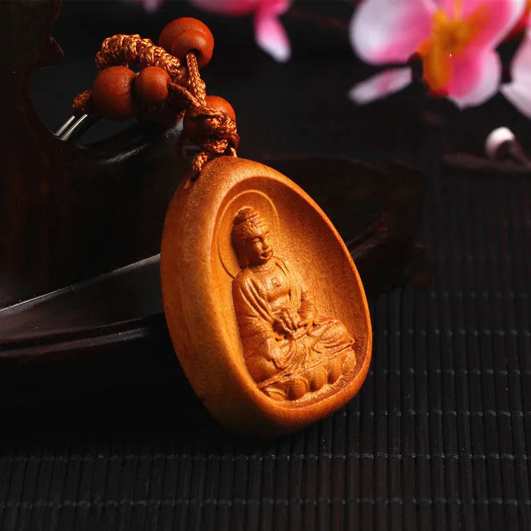 Eight patron saint keychains made of natural Taomu wood in orange colour, each measuring 10x3.2x4cm