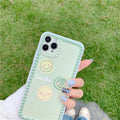 Geometric smiley face TPU iPhone case with polka dot frame on iPhone