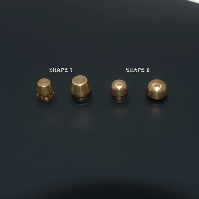 Brass decorative buckle foot nails in round and bucket styles measuring 10x6mm and 12x7mm