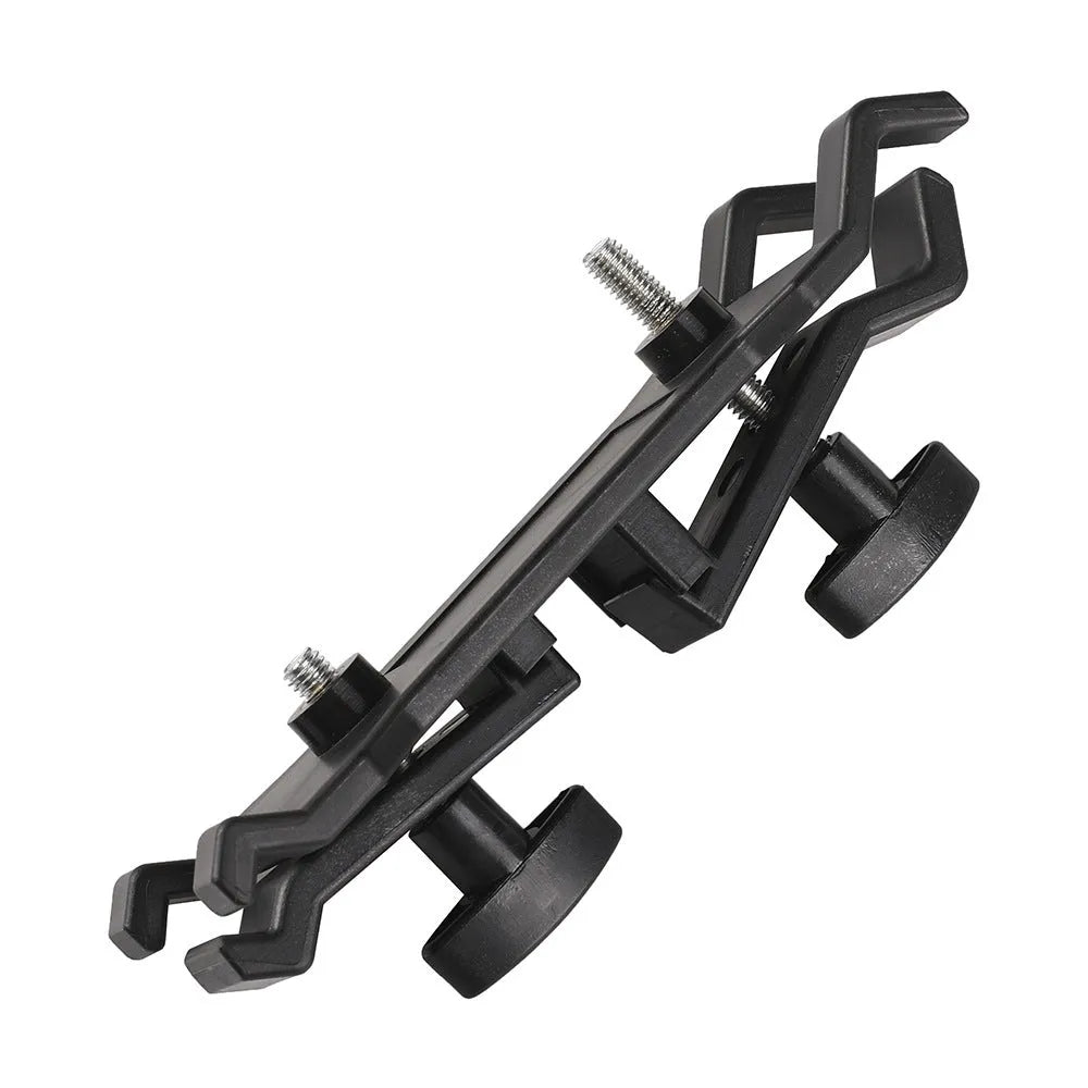 Black ABS plastic umbrella clip for attaching a brolly to a camera tripod.
