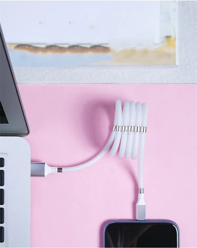 Black magnetic charging cable with aluminium connectors compatible with Apple iPhone and Android devices