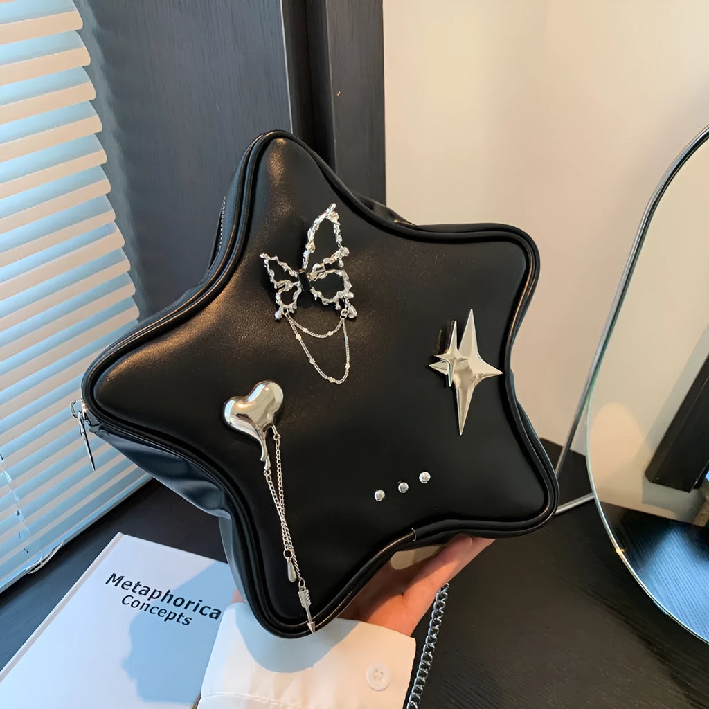 Black women's PU backpack with metal butterfly pendant, chain strap, and an outer 3D pocket.