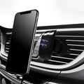 Glory black ABS plastic car phone holder clipped onto a car air vent.