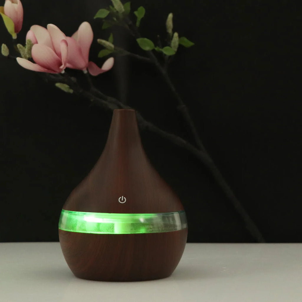 USB mini desktop air purifier and humidifier in wood grain finish for small rooms.