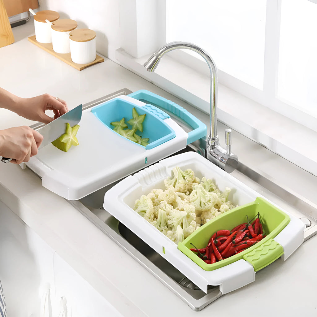 Green multi-function kitchen cutting board with drainage holes mounted on a sink edge