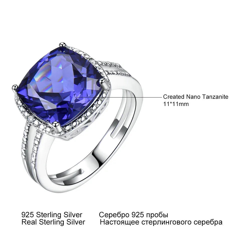 Blue tanzanite stone set in sterling silver women's ring with alloy accessory