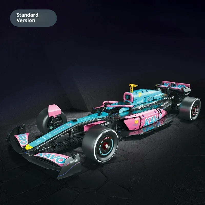 Mechanical F1 racing building blocks car in blue and pink with small plastic particles assembled on a surface