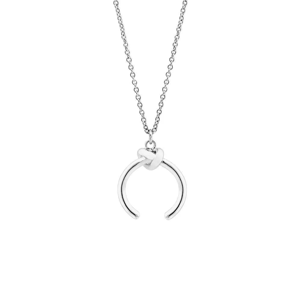 A vintage-style geometric pendant necklace with an adjustable copper chain in a gold finish.