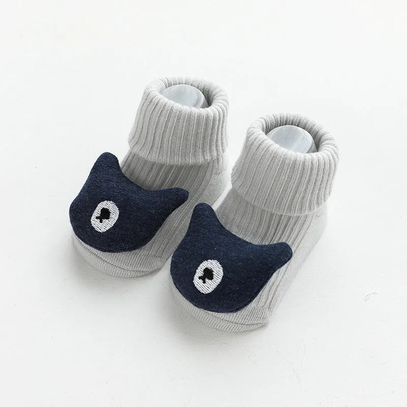 Children's combed cotton non-slip socks in multiple colours for sizes XS, S, and M.