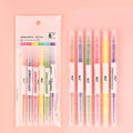 Six double-headed highlighter pens showing round and oblique tips in orange, purple, yellow, green, blue and pink colours