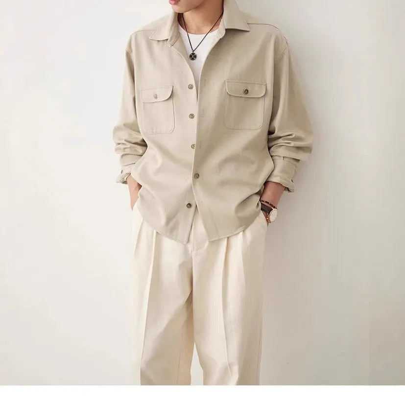 Men's simple lapel casual shirt in light sand rice colour, showing long sleeves and front button placket.