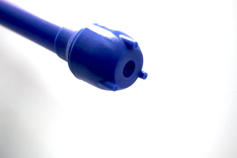 Blue and red manual hand siphon pump for fuel and liquid transfer.