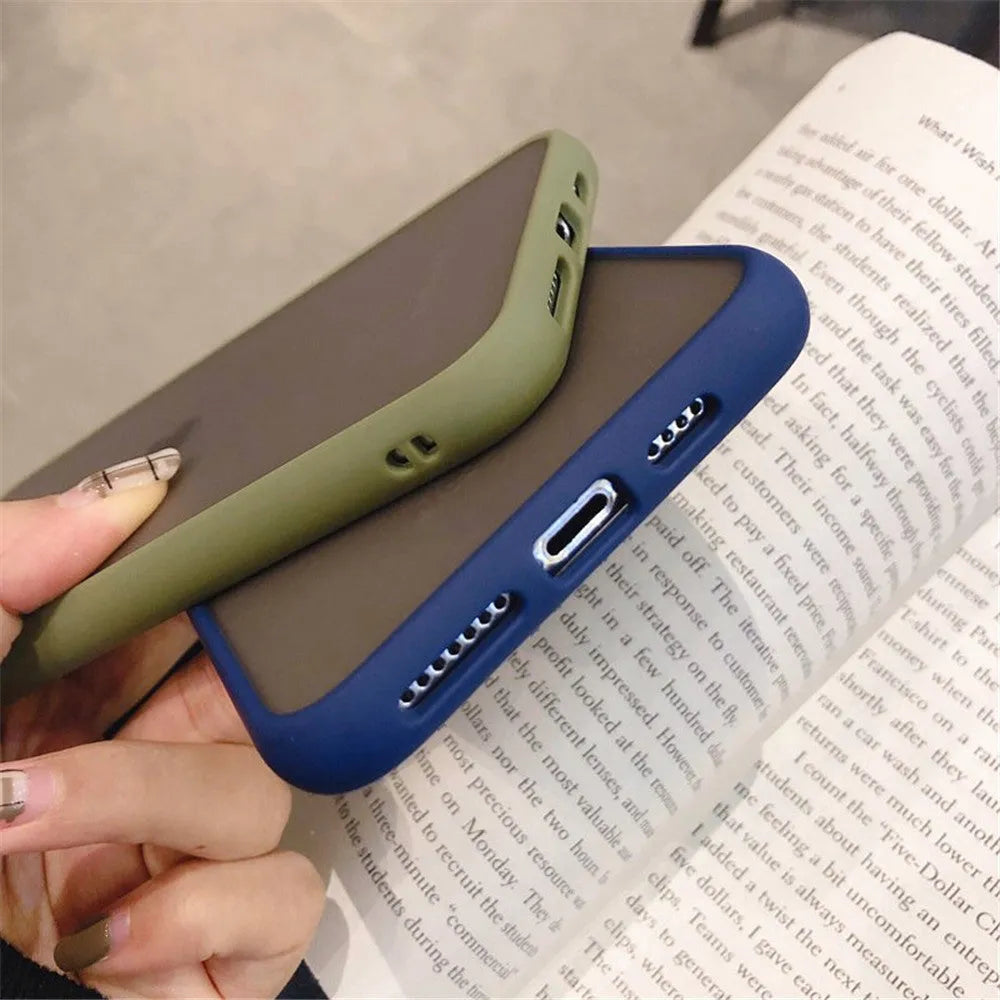 Solid colour hybrid shockproof protective case for iPhone models on a neutral background.