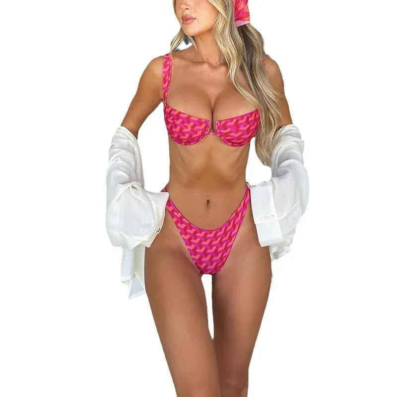 Women's striped printed bikini set in pink with brief-cut bottom and sleeveless top for swimming