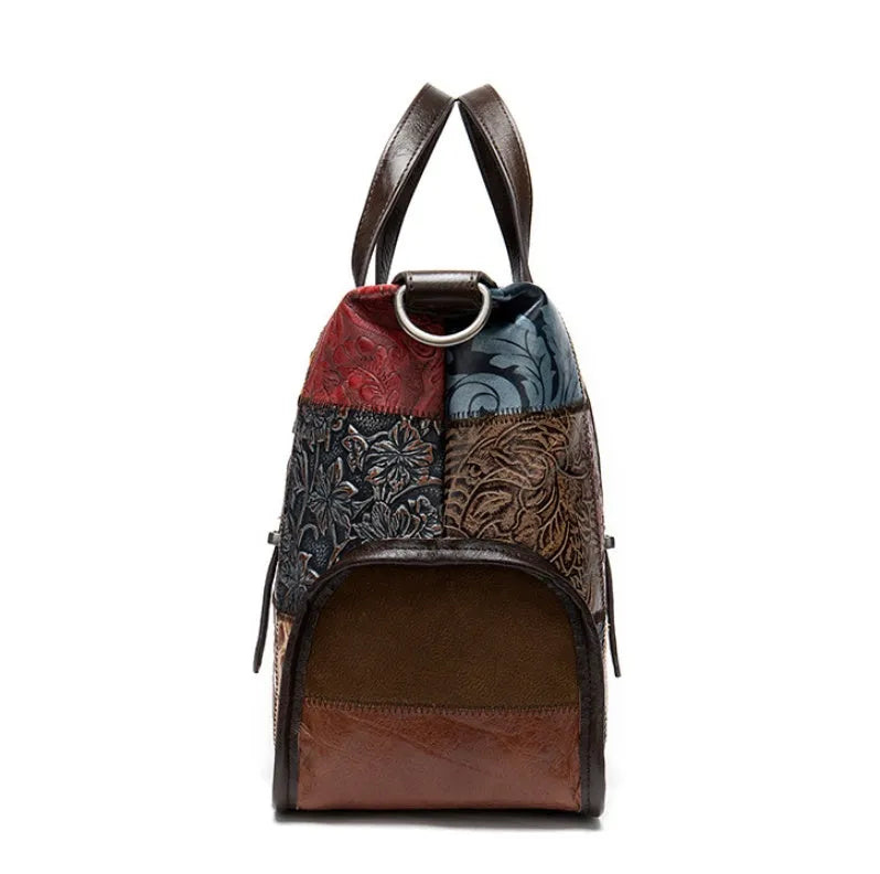 Cowhide leather women's handbag in multi-colour, 36cm long with zip closure and shoulder straps.