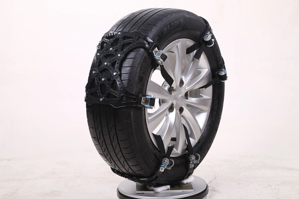 Yellow universal snow chain made from widened thickened TPU with steel nails for non-slip winter traction